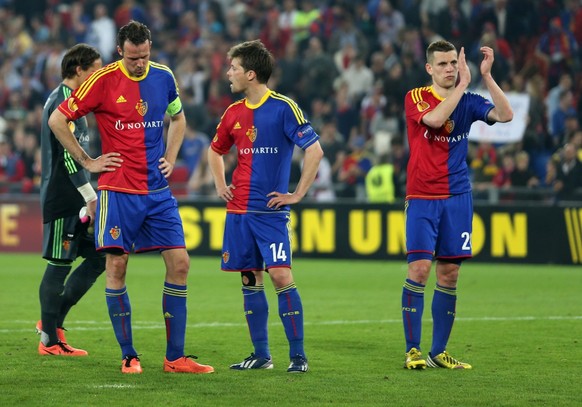 Basel&#039;s Marco Streller, Basel&#039;s Valentin Stocker and Basel&#039;s Fabian Frei, from left are dejecdet after the UEFA Europa League semifinal first leg soccer match between Switzerland&#039;s ...