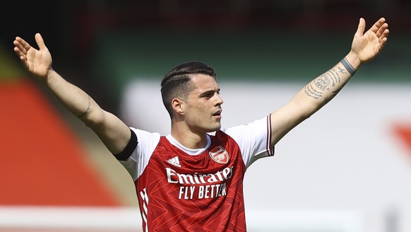 Arsenal&#039;s Granit Xhaka reacts during an English Premier League soccer match between Arsenal and Fulham at the Emirates stadium in London, England, Sunday April 18, 2021. (Julian Finney/Pool via A ...