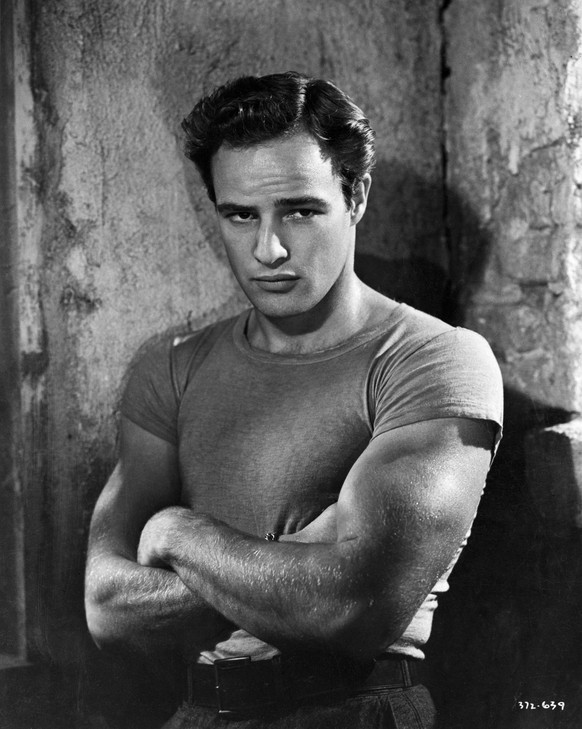 Marlon Brando, in character as Stanley Kowalski from Tennessee Williams&#039; A Streetcar Named Desire. Brando portrayed Kowalski in the 1952 film of the play directed by Elia Kazan.