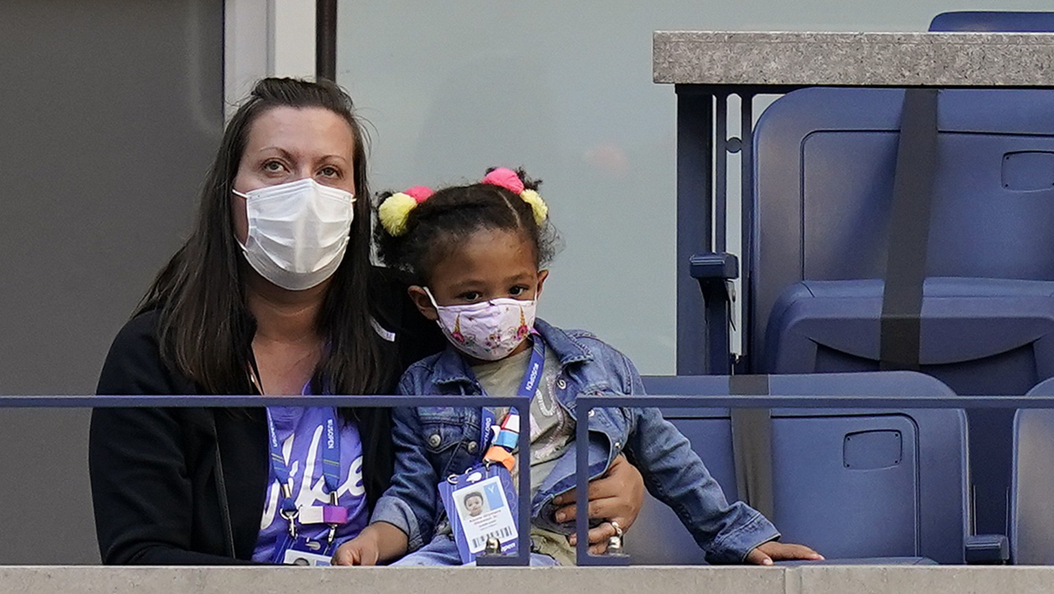 Three-year-old Alexis Olympia Ohanian Jr., right, daughter of Serena Williams, of the United States, watches her mother play against Sloane Stephens, of the United States, during the third round of th ...