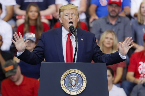 President Donald Trump speaks at a campaign rally at U.S. Bank Arena, Thursday, Aug. 1, 2019, in Cincinnati. (AP Photo/John Minchillo)
Donald Trump