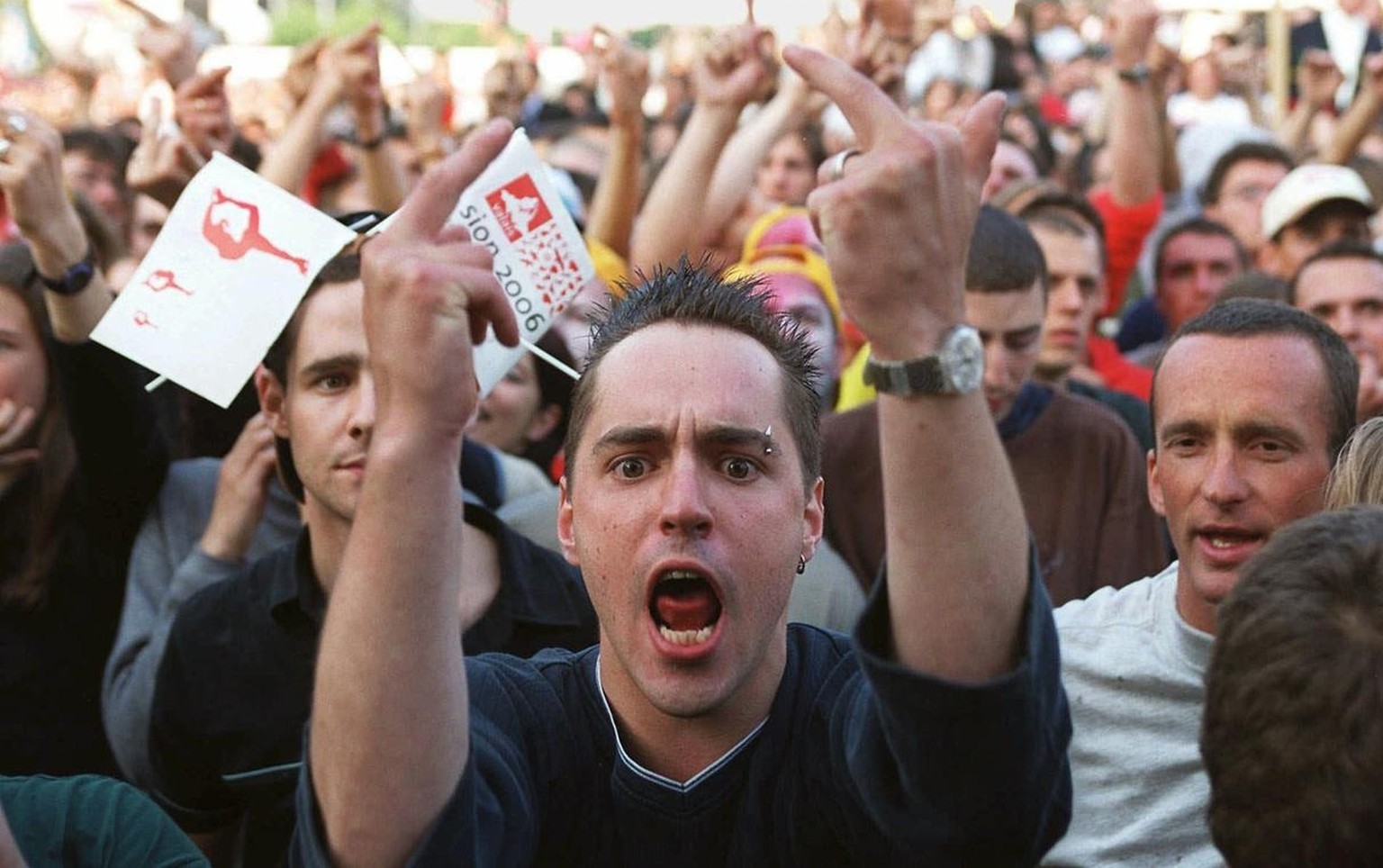 A young supporter of the candidature Sion 2006 shows his disappointment and anger in Sion, Switzerland, Saturday, June 19, 1999 immediately after the International Olympic Committee (IOC) president Ju ...