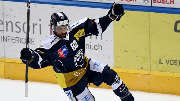 Ambri&#039;s player Michael Ngoy celebrates the 1 - 0 goal, during the preliminary round game of National League Swiss Championship 2018/19 between HC Ambri Piotta and EV Zug, at the ice stadium Valas ...