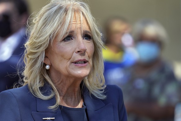 Jill Biden speaks to reporters while campaigning for her husband Democratic presidential candidate and former Vice President Joe Biden, during a voting poll meet and greet Tuesday, Nov. 3, 2020, in St ...