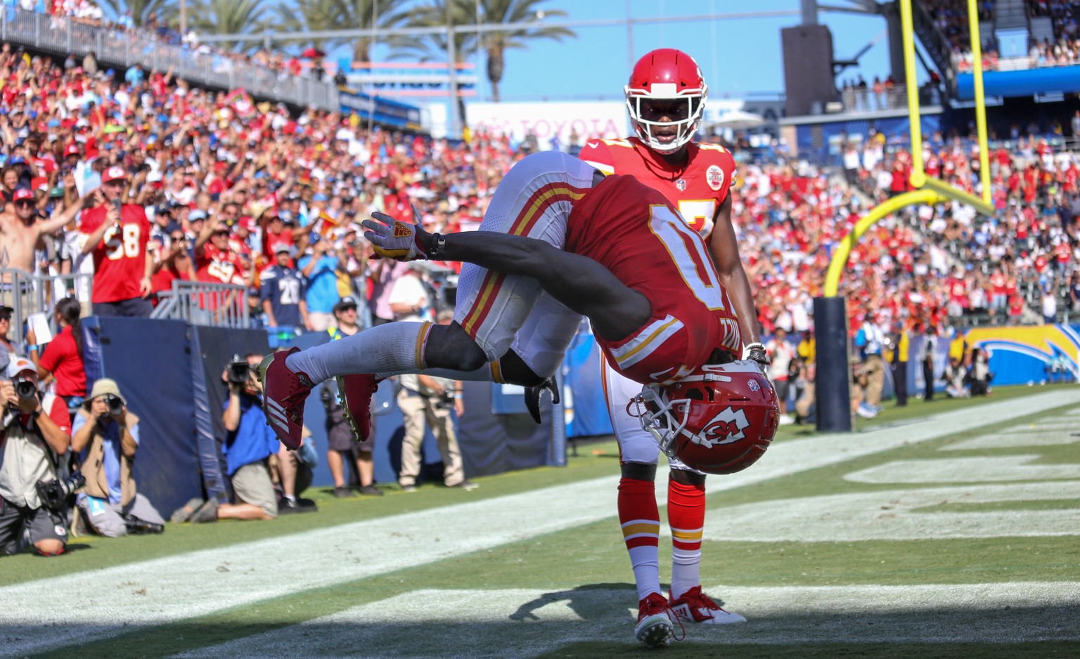 epa07009419 Kansas City Chiefs wide receiver Tyreek Hill (L) does a back flip celebration of his touchdown catch as teammate Chris Conley looks on against the Los Angeles Chargers during the second ha ...