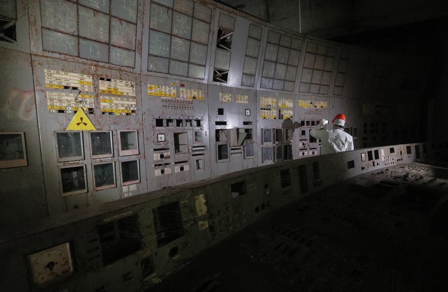 epa07869104 Journalists visit the control room of the plant&#039;s fourth reactor at the Chernobyl nuclear power plant, in Chernobyl, Ukraine, 25 September 2019. The explosion of Unit 4 of the Chernob ...