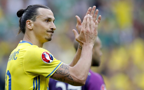 FILE - In this Monday, June 13, 2016 file photo, Sweden&#039;s Zlatan Ibrahimovic applauds during the Euro 2016 Group E soccer match between Ireland and Sweden at the Stade de France in Saint-Denis, n ...