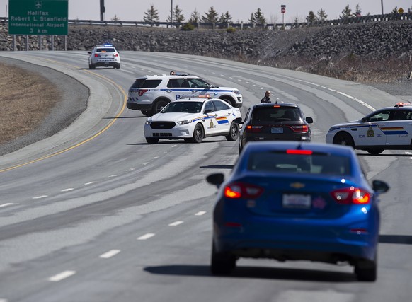 Police block the highway in Enfield, Nova Scotia on Sunday, April 19, 2020. Canadian police say multiple people are dead plus the suspect after a shooting rampage across the province of Nova Scotia. I ...