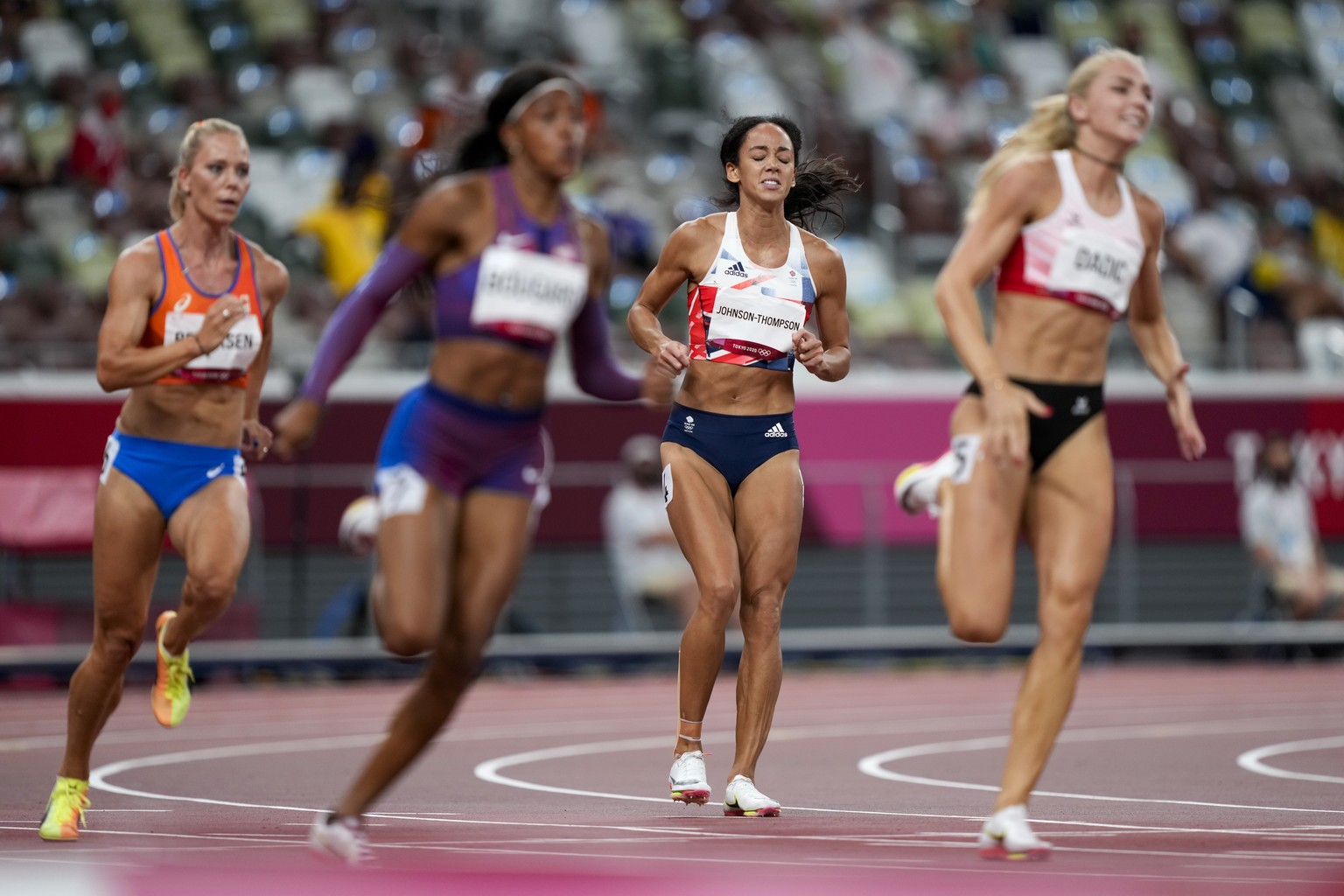 Katarina Johnson-Thompson, of Britain, reacts during a heat in the heptathlon women&#039;s 200-meter at the 2020 Summer Olympics, Wednesday, Aug. 4, 2021, in Tokyo. (AP Photo/Martin Meissner)
