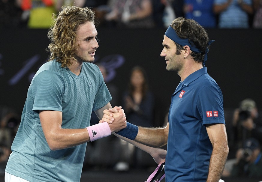 Greece&#039;s Stefanos Tsitsipas, left, is congratulated by Switzerland&#039;s Roger Federer after winning their fourth round match at the Australian Open tennis championships in Melbourne, Australia, ...
