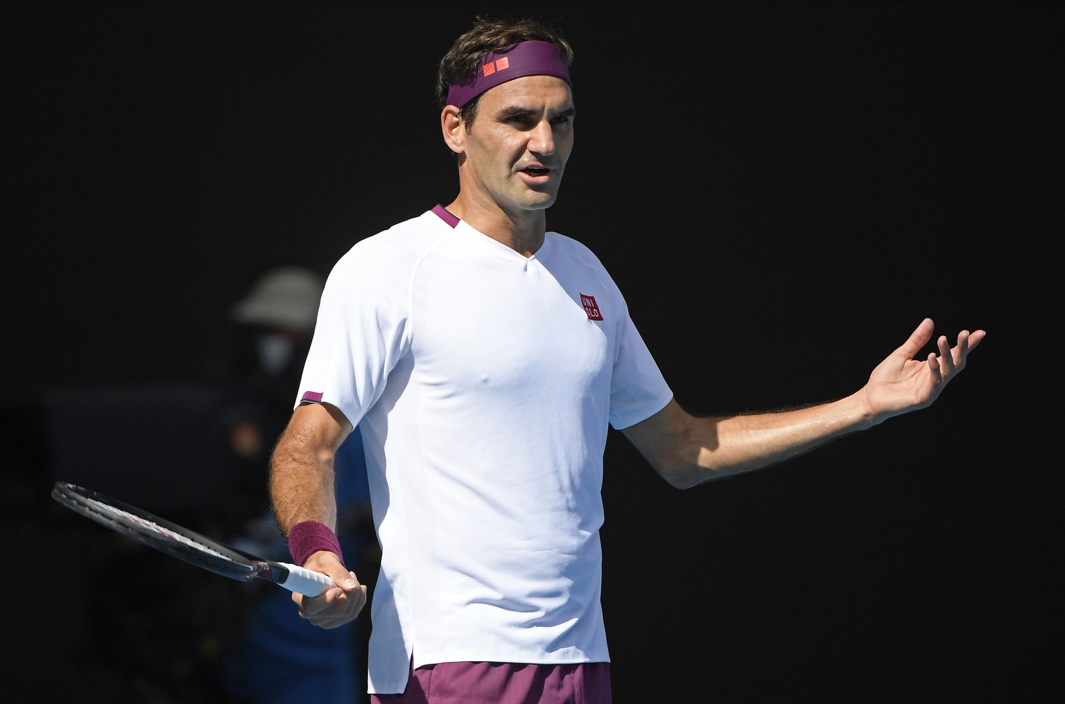 Switzerland&#039;s Roger Federer reacts during his quarterfinal against Tennys Sandgren of the U.S. at the Australian Open tennis championship in Melbourne, Australia, Tuesday, Jan. 28, 2020. (AP Phot ...
