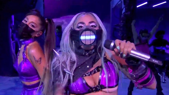 In this video grab issued Sunday, Aug. 30, 2020, by MTV, Ariana Grande, left, and Lady Gaga perform &quot;Rain On Me&quot; during the MTV Video Music Awards. (MTV via AP)