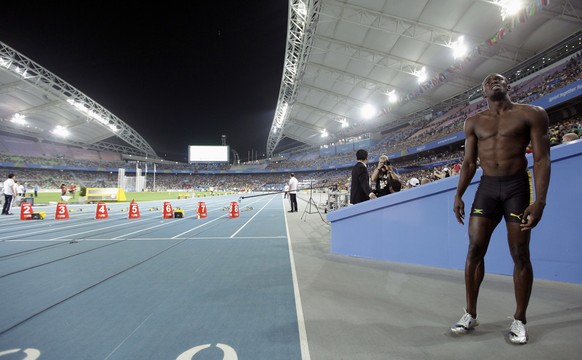 Jamaica&#039;s Usain Bolt reacts after being disqualified after a false start in the Men&#039;s 100m final at the World Athletics Championships in Daegu, South Korea, Sunday, Aug. 28, 2011. (AP Photo/ ...