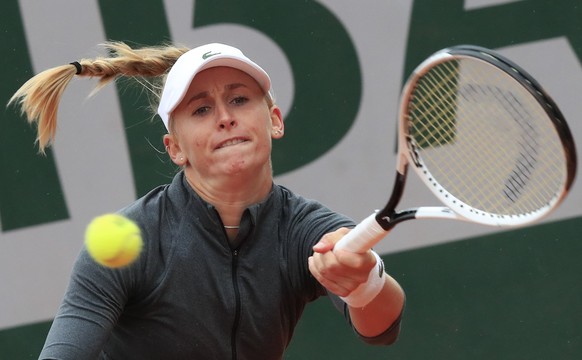 Switzerland&#039;s Jil Teichmann plays a shot against Romania&#039;s Irina-Camelia Begu in the first round match of the French Open tennis tournament at the Roland Garros stadium in Paris, France, Sun ...