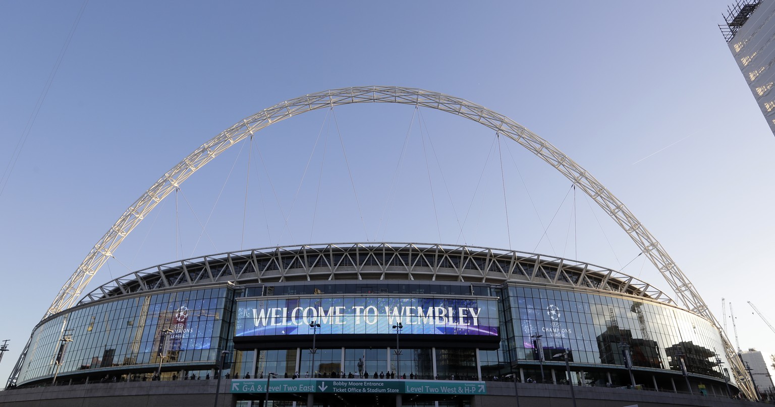 FILE In this Wednesday, Oct. 3, 2018 file photo, a view of the exterior of Wembley Stadium in London. With coronavirus restrictions eased to allow fans back into stadiums, there at least will be some  ...