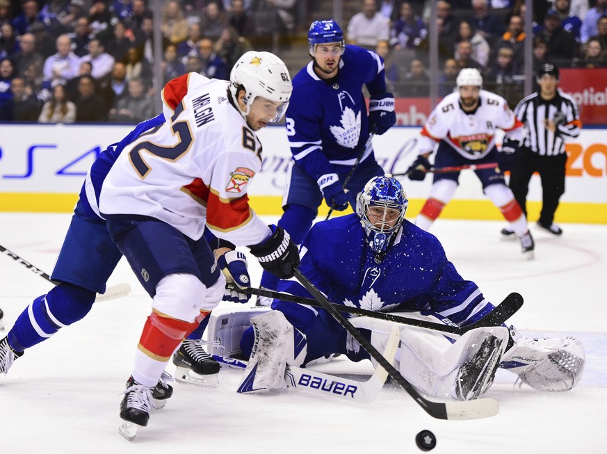 Florida Panthers center Denis Malgin (62) moves in on Toronto Maple Leafs goaltender Frederik Andersen (31) during the first period of an NHL hockey game, Monday, Feb. 3, 2020 in Toronto. (Frank Gunn/ ...