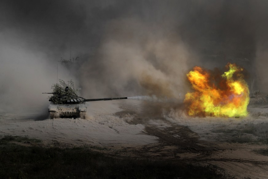 epa08691036 A Russian tank T-72B3 fires during the Kavkaz-2020 (The Caucasus 2020) military exercises at the range Raevsky in Krasnodar region, Russia, 23 September 2020. The Caucasus 2020 strategic c ...