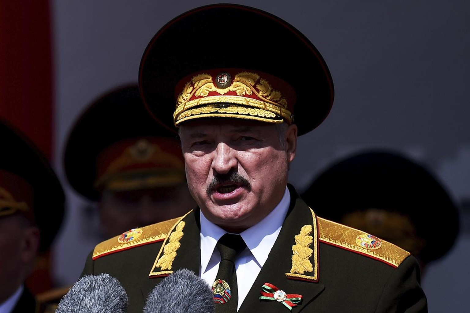 FILE - In this Saturday, May 9, 2020 file photo, Belarusian President Alexander Lukashenko gives a speech during a military parade that marked the 75th anniversary of the allied victory over Nazi Germ ...