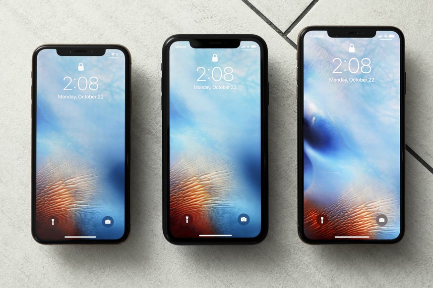 FILE - This Oct. 22, 2018, file photo shows the iPhone XS, from left, iPhone XR, and the iPhone XS Max in New York. Apple hoped to offset slowing demand for iPhones by raising the prices of its most i ...