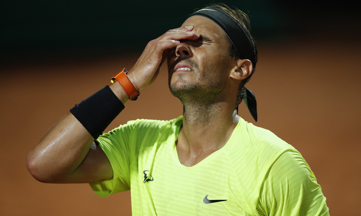 epa08682697 Rafael Nadal of Spain reacts during his men&#039;s singles quarter-finals round match against Diego Schwartzman of Argentina at the Italian Open tennis tournament in Rome, Italy, 19 Septem ...