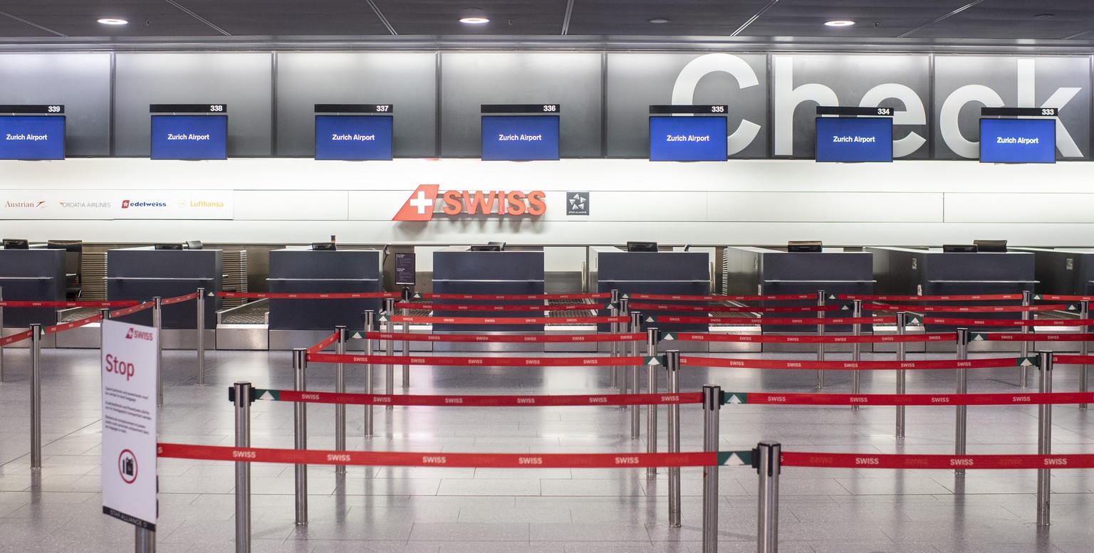 Ein leerer Check-In Bereich am Flughafen in Zuerich ein, aufgenommen am Samstag, 14. Maerz 2020. (KEYSTONE/Ennio Leanza)