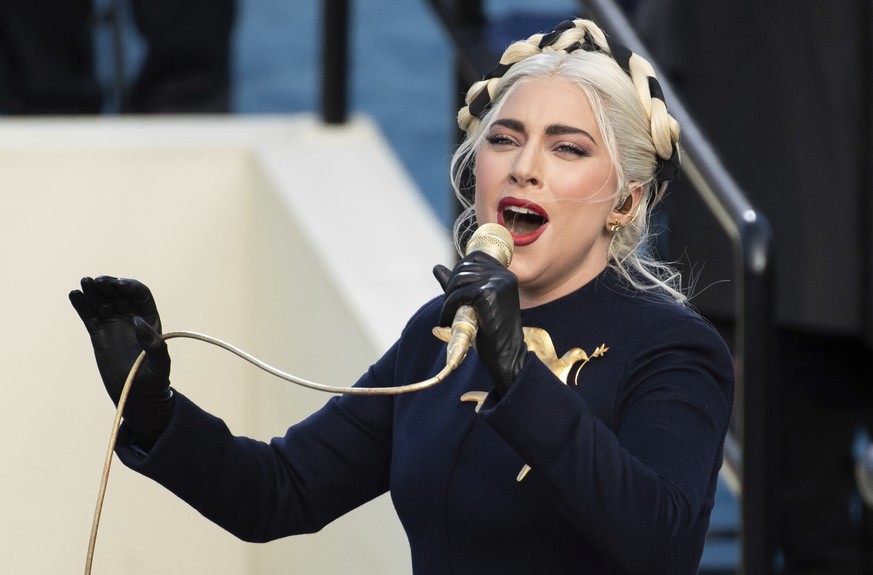 FILE - In this Wednesday, Jan. 20, 2021 file photo, Lady Gaga sings the national anthem during President-elect Joe Biden&#039;s inauguration at the U.S. Capitol in Washington. Lady Gaga&#039;s two Fre ...