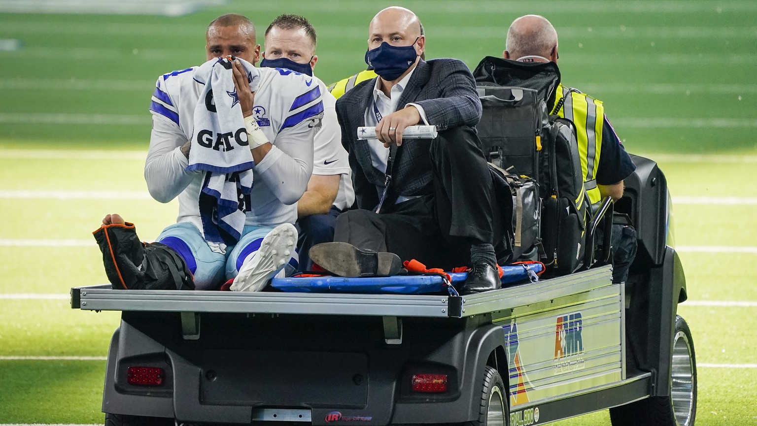 Dallas Cowboys quarterback Dak Prescott leaves the field on a cart after beig injured on a tackle by New York Giants cornerback Logan Ryan during the third quarter of an NFL football game on Sunday, O ...