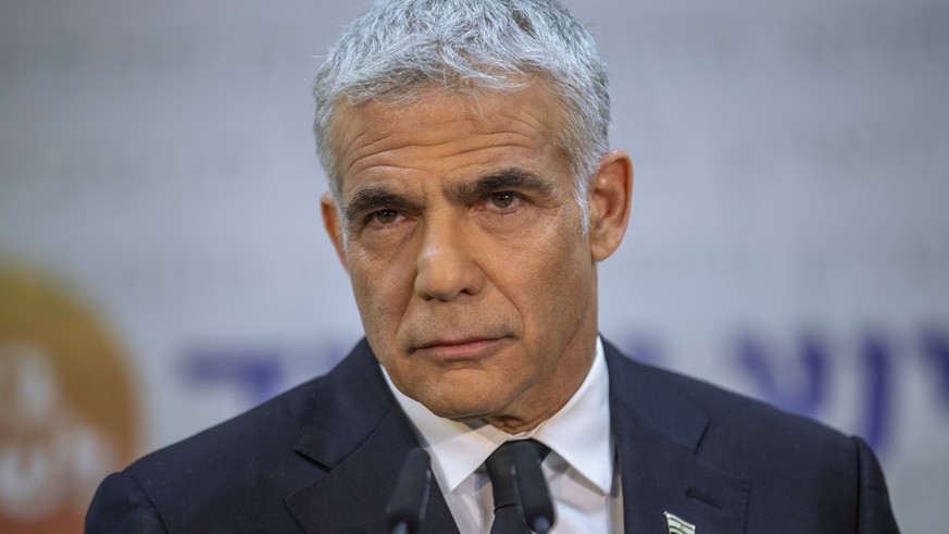 FILE - In this May 6, 2021, file photo, Israeli opposition leader Yair Lapid listens during a news conference in Tel Aviv, Israel. Prime Minister Benjamin Netanyahu&#039;s opponents on Wednesday, June ...