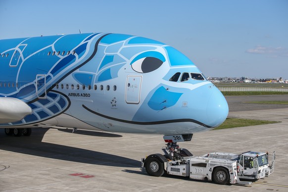 epa07451257 The first Airbus A380 is delivered to All Nippon Airways (ANA), the largest airline in Japan, on the tarmac of the Airbus delivery center in Colomiers, near Toulouse, southern France, 20 M ...