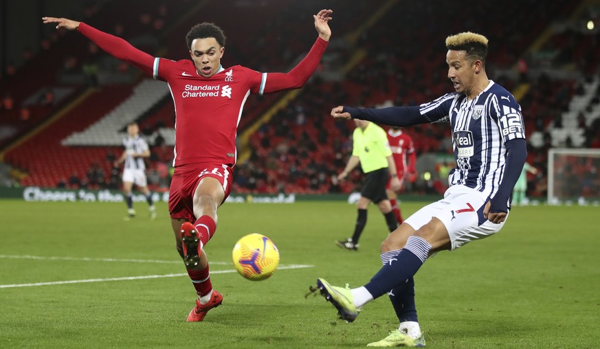 Liverpool&#039;s Trent Alexander-Arnold, left, tries to block a cross by West Bromwich Albion&#039;s Callum Robinson during an English Premier League soccer match between Liverpool and West Bromwich A ...
