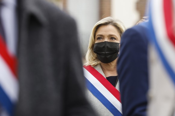 epa09169039 Far-right Rassemblement National (RN) party&#039;s president Marine Le Pen stands prior to a remembrance gathering for late Stephanie Monferme, a mother and local police employee, in Rambo ...