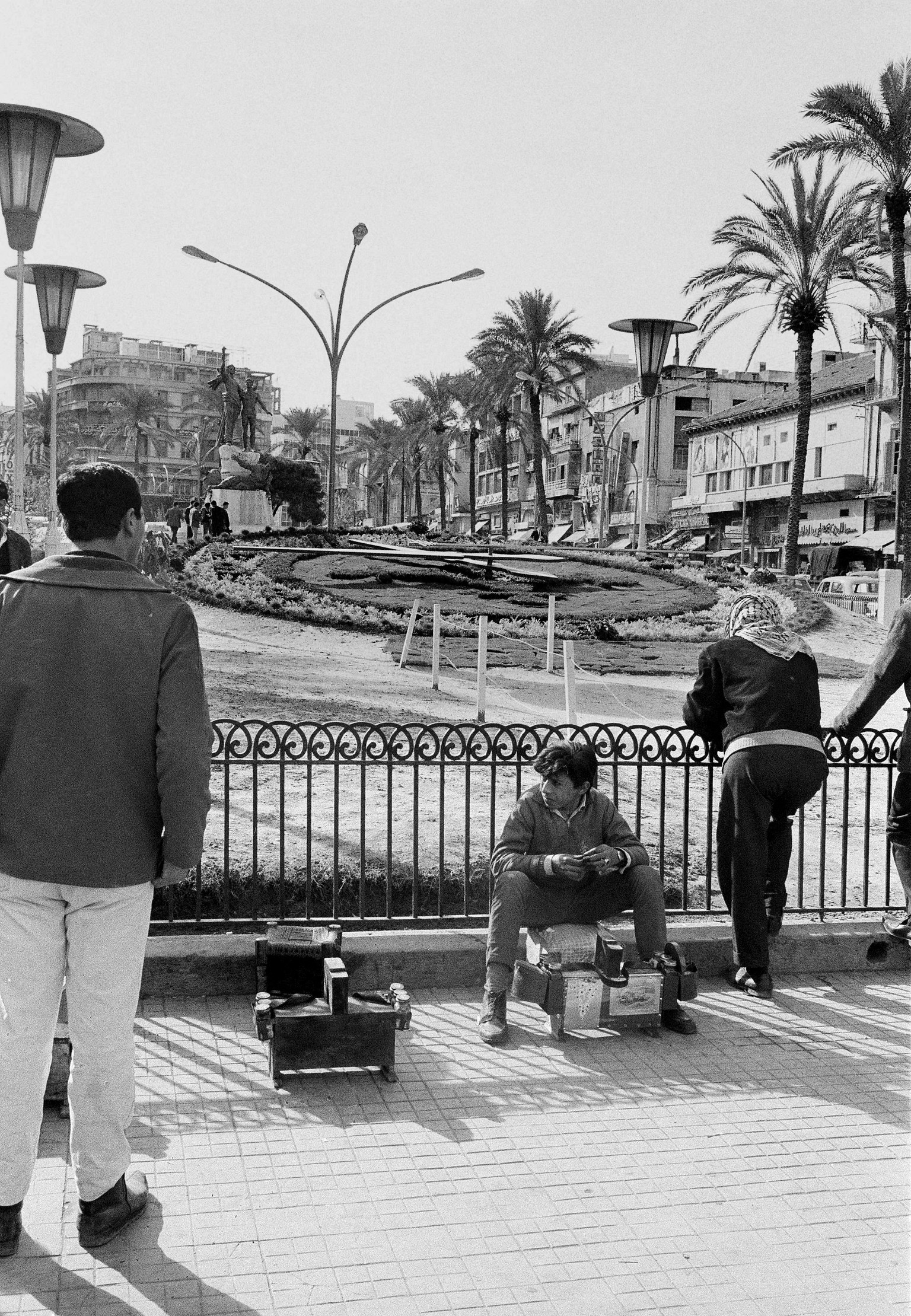A shoe-shine boy and and others resting in Martyrs&#039; Square in the Old Beirut section of Lebanon, Feb. 1969. (AP Photo)