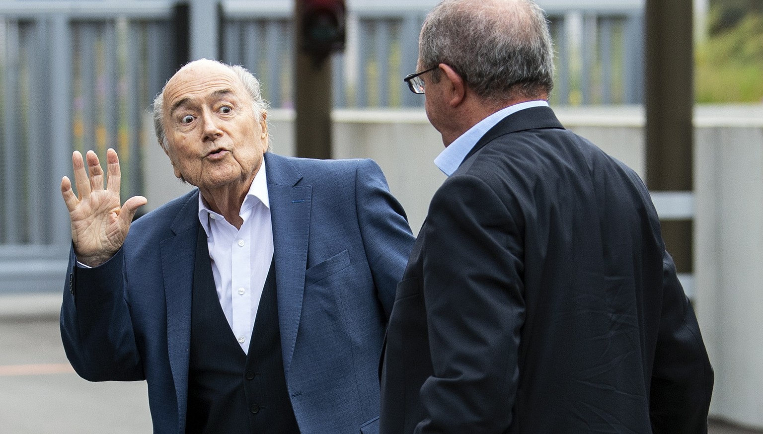epa08638582 Former FIFA president Sepp Blatter (L) arrives in front of the building of the Office of the Attorney General of Switzerland, in Bern, Switzerland, 01 September 2020. Former UEFA president ...
