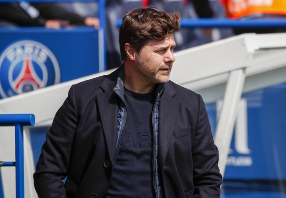 PSG&#039;s head coach Mauricio Pochettino watches play during the French League One soccer match between Paris Saint-Germain and St Etienne at Parc Des Princes in Paris, France, Sunday, April 18, 2021 ...