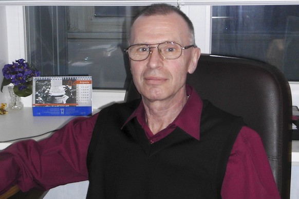 In this handout photo taken on May, 2011 by Russian chemical experts Vladimir Uglev poses for a photograph at an undisclosed location. Uglev told The Associated Press said he was the scientist who in  ...