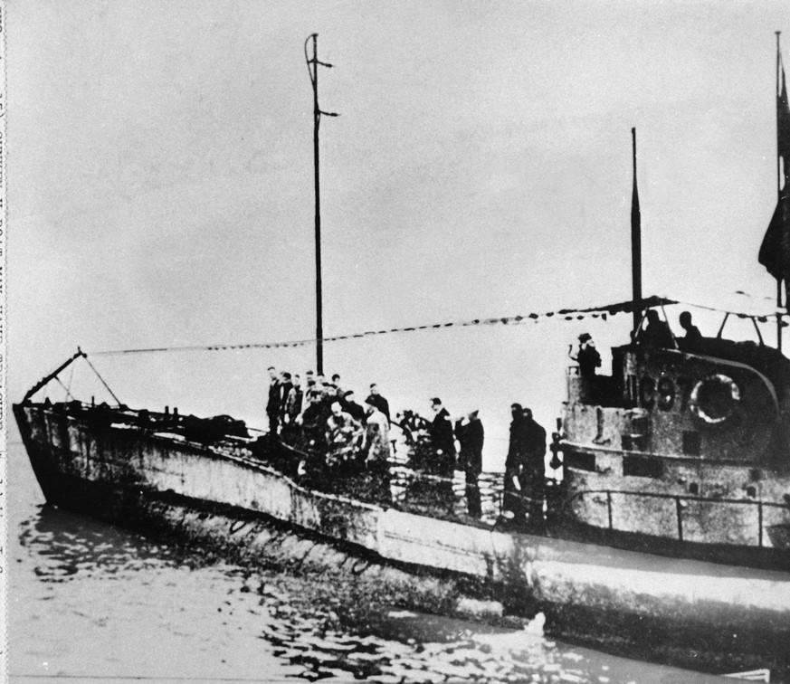 FILE - In this undated photo people stand on the deck of a World War I German submarine type UC-97 in an unknown location. Belgian regional authorities on Tuesday, Sept. 19, 2017 say that an intact Ge ...