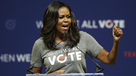 Former first lady Michelle Obama speaks at a rally to encourage voter registration on Friday, Sept. 28, 2018, in Coral Gables, Fla. (AP Photo/Brynn Anderson)