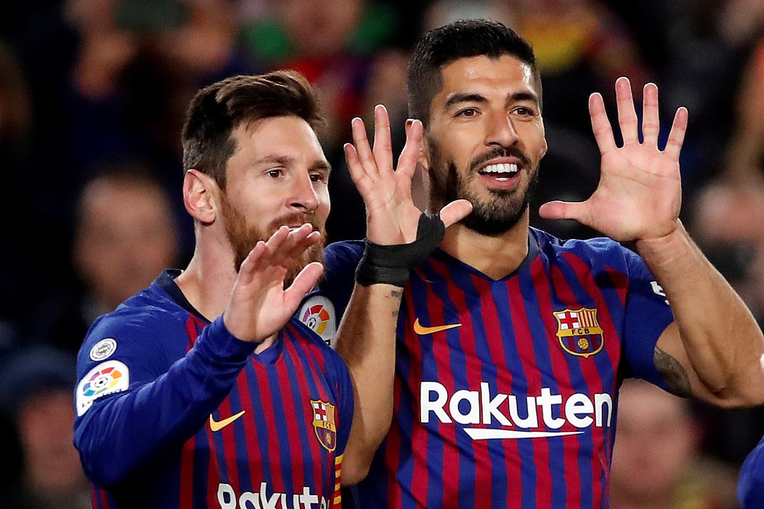 epa07280678 FC Barcelona&#039;s Luis Suarez (R) celebrates with teammate Lionel Messi (L) after scoring the 3-0 lead during the Spanish La Liga Primera Division soccer match between FC Barcelona and S ...