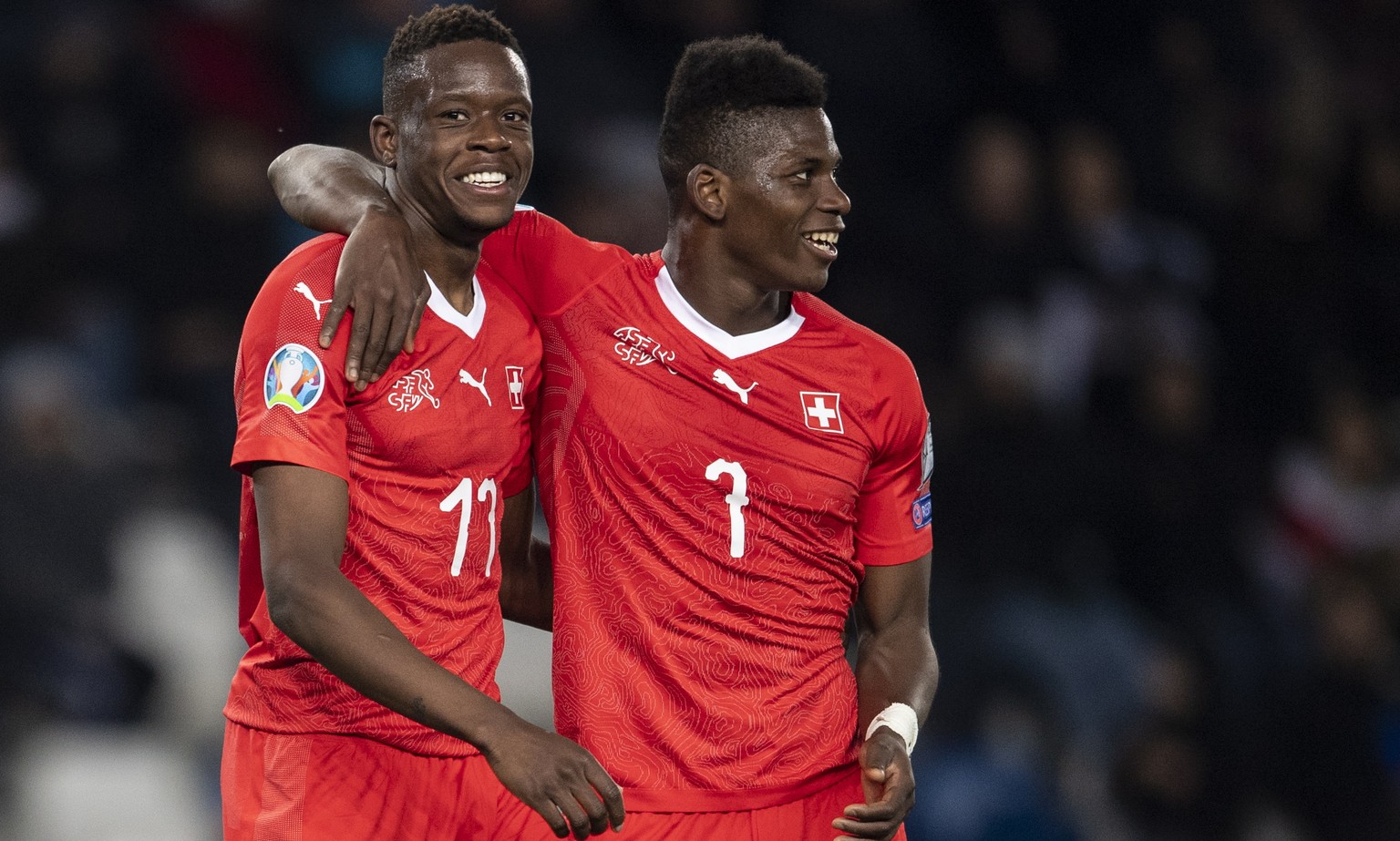epa07458643 Switzerland&#039;s Denis Zakaria (L) celebrates his goal with Breel Embolo (R) during the UEFA Euro 2020 qualifier Group D soccer match between Georgia and Switzerland at the Boris Paichad ...