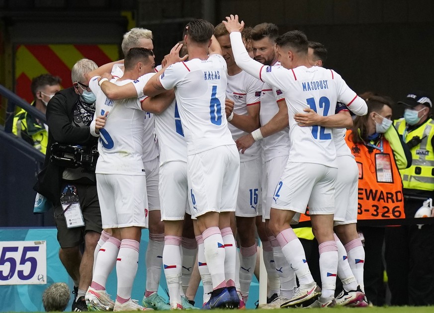 epa09270536 Players of the Czech Republic celebrate their first goal during the UEFA EURO 2020 group D preliminary round soccer match between Scotland and the Czech Republic in Glasgow, Britain, 14 Ju ...