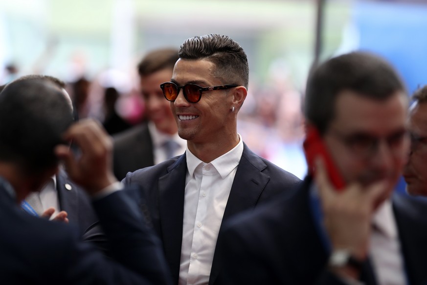 Juventus&#039; soccer player Cristiano Ronaldo arrives for the UEFA Champions League group stage draw at the Grimaldi Forum, in Monaco, Thursday, Aug. 29, 2019. (AP Photo/Daniel Cole)
Cristiano Ronald ...
