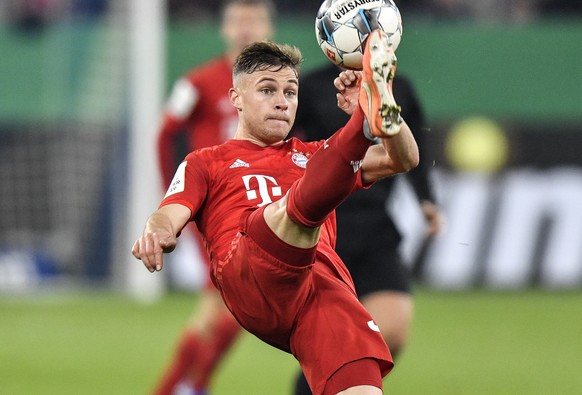 Bayern&#039;s Joshua Kimmich plays the ball during the German soccer cup, DFB Pokal, quarter-final match between FC Schalke 04 and Bayern Munich in Gelsenkirchen, Germany, Tuesday, March 3, 2020. (AP  ...