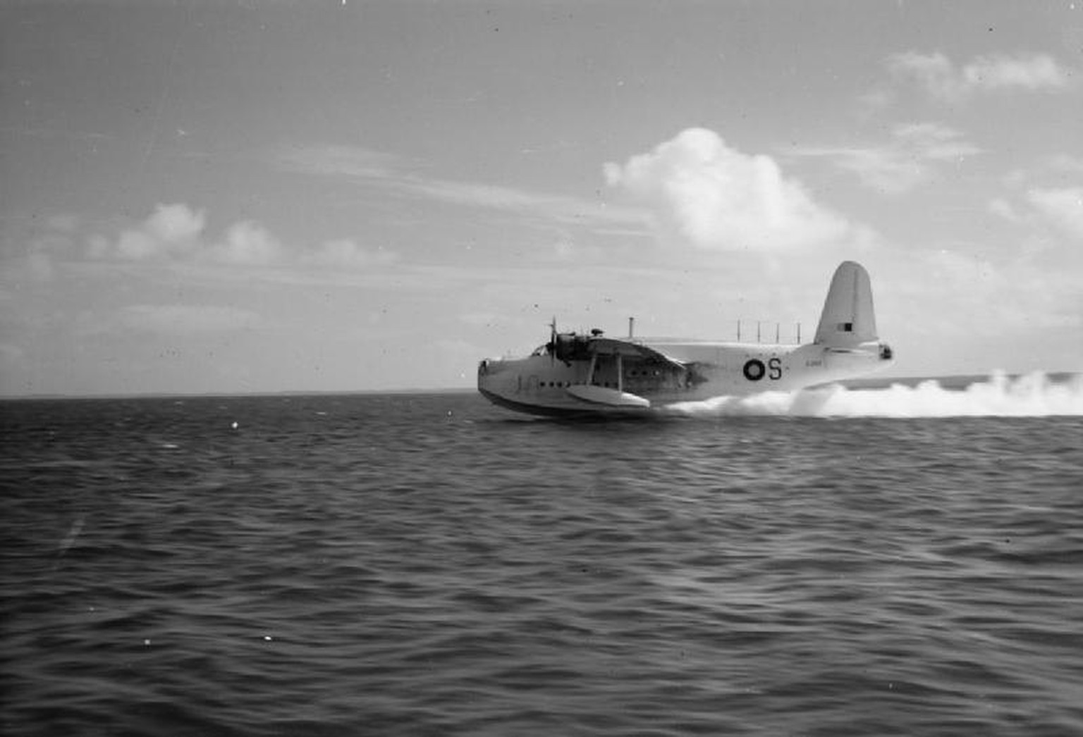Aircraft of the Royal Air Force 1939-1945- Short S.25 Sunderland.
Sunderland Mark III, EJ143 S, of No. 230 Squadron RAF Detachment, piloted by Flight Lieutenant A W Deller, taking off at Addu Atoll, ...