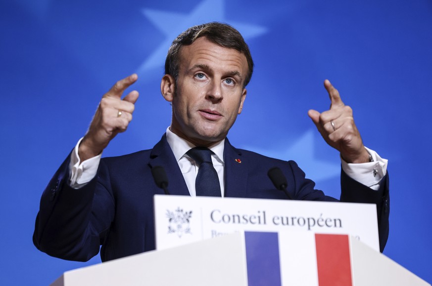 French President Emmanuel Macron speaks during a media conference at the end of an EU summit in Brussels, Friday, Oct. 16, 2020. European Union leaders met for the second day of an EU summit, amid the ...