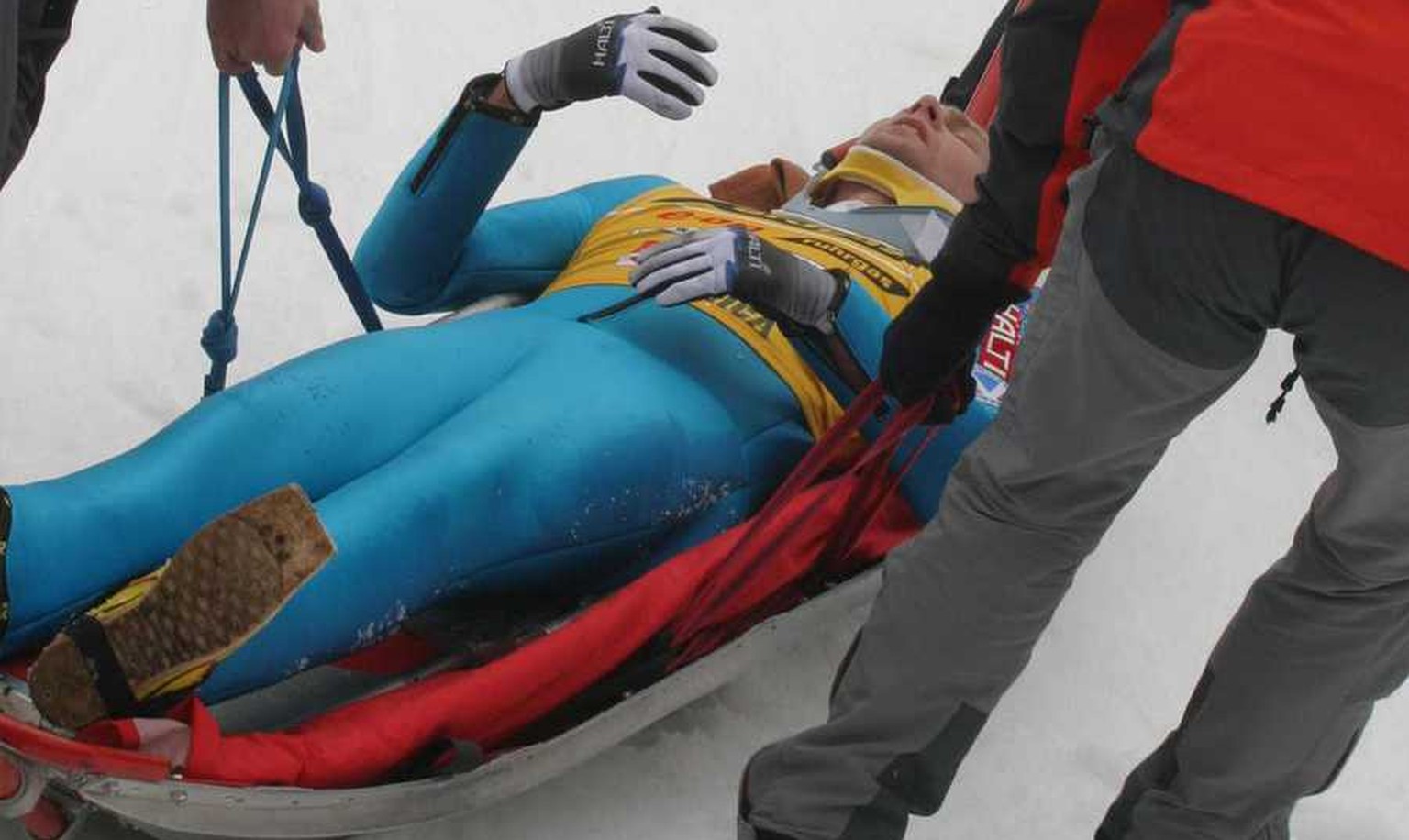 Overall World Cup winner Janne Ahonen of Finland is carried away after a bad landing during the World Cup Ski Jumping competition in Planica, Slovenia, Sunday, March 20, 2005. Ahonen jumped 240 meters ...