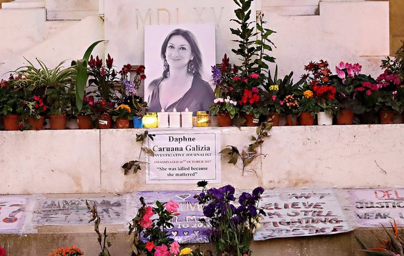 epa06370196 A memorial for the slain Malta journalist Daphne Caruana Galizia at the Great Siege monument opposite the Malta law courts in Valletta, Malta, 05 December 2017. On 05 December 2017 the thr ...