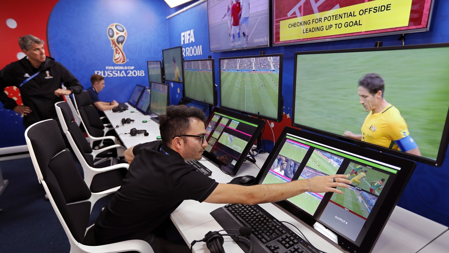 epaselect epa06795869 A view of the video assistant referee (VAR) video operation room (VOR) of the 2018 World Cup International Broadcast Centre (IBC) in Moscow, Russia, 09 June 2018. The FIFA World  ...