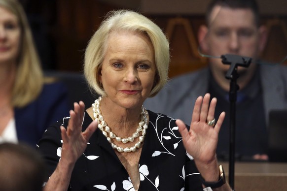 FILE - In this Jan. 13, 2020, file photo Cindy McCain, wife of former Arizona Sen. John McCain, waves to the crowd after being acknowledged by Arizona Republican Gov. Doug Ducey during his State of th ...