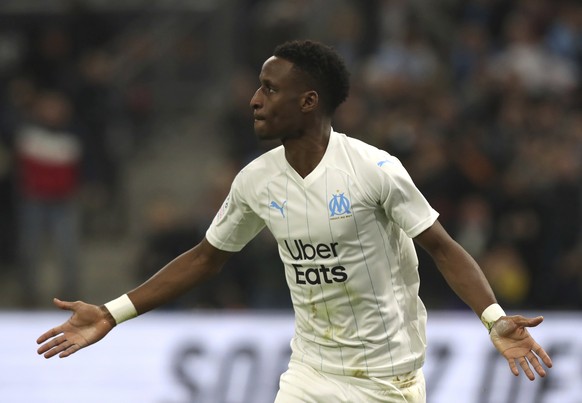 Marseille&#039;s Bouna Sarr celebrates after scoring his side&#039;s opening goal during the French League One soccer match between Marseille and Brest at the Velodrome stadium in Marseille, southern  ...