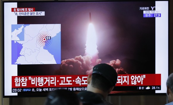 People watch a TV news program reporting about North Korea&#039;s firing projectiles with a file image at the Seoul Railway Station in Seoul, South Korea, Saturday, Aug. 10, 2019. North Korea on Satur ...